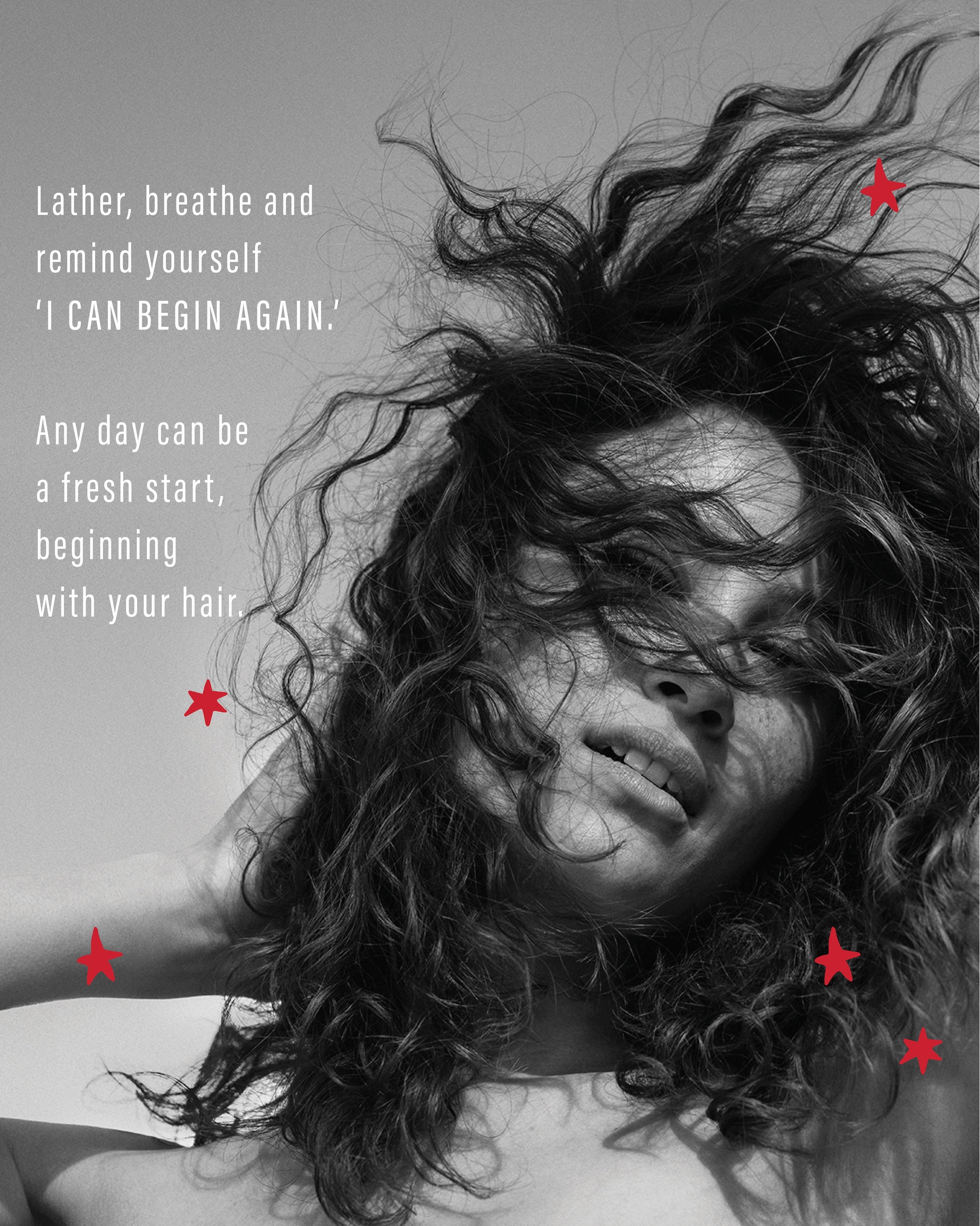 Black-and-white portrait of Alli Webb with windswept waves beside the mantra 'I CAN BEGIN AGAIN — any day can be a fresh start, beginning with your hair.'